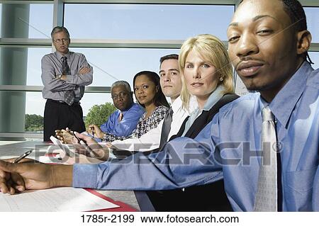 Business colleagues in a meeting View Large Photo Image Stock Photo - Business colleagues in a meeting. Fotosearch