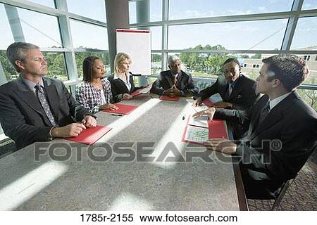 Business colleagues in a meeting View Large Photo Image Stock Photography - Business colleagues in a meeting. Fotosearch
