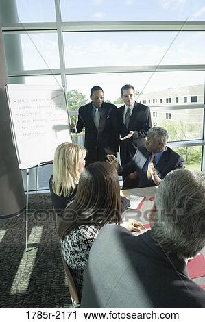Business presentation in conference room View Large Photo Image Stock Image - Business presentation in conference room. Fotosearch