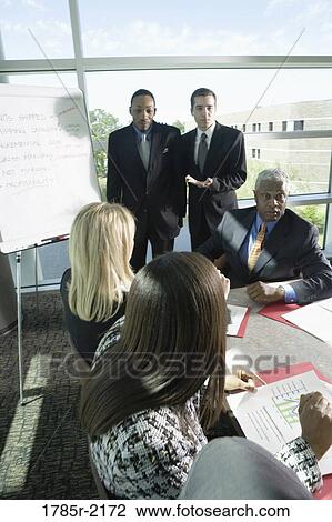 Business presentation in conference room View Large Photo Image Stock Image - Business presentation in conference room. Fotosearch