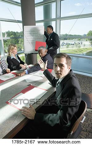 Business presentation in conference room View Large Photo Image Stock Photo - Business presentation in conference room. Fotosearch