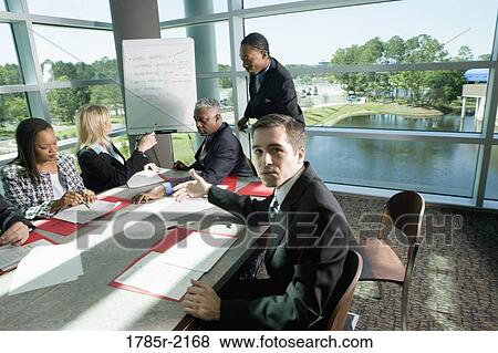 Business presentation in conference room View Large Photo Image Stock Photo - Business presentation in conference room. Fotosearch