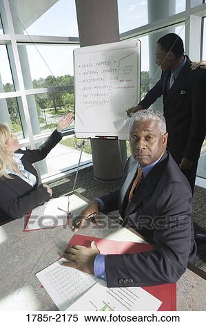 Business presentation in conference room View Large Photo Image Stock Photography - Business presentation in conference room. Fotosearch