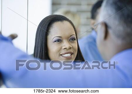 Businesswoman smiling View Large Photo Image Picture - Businesswoman smiling. Fotosearch