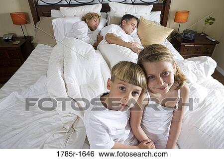 Children waiting for parents to wake up View Large Photo Image Stock Photograph - Children waiting for parents to wake up. Fotosearch