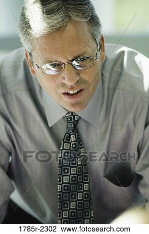 Close-up of a businessman View Large Photo Image Stock Image - Close-up of a businessman. Fotosearch