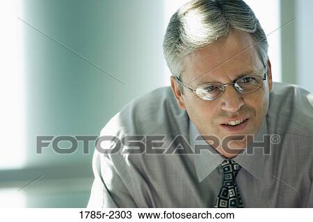 Close-up of a businessman View Large Photo Image Stock Image - Close-up of a businessman. Fotosearch