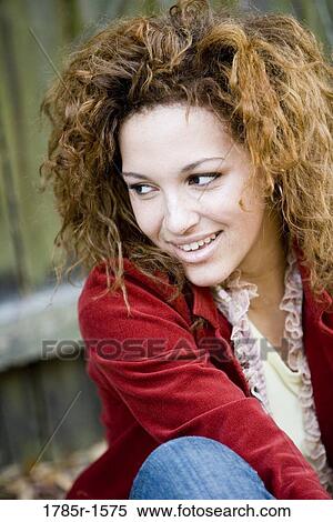 Close up of a contemplative young woman View Large Photo Image Stock Photography - Close up of a contemplative young woman. Fotosearch