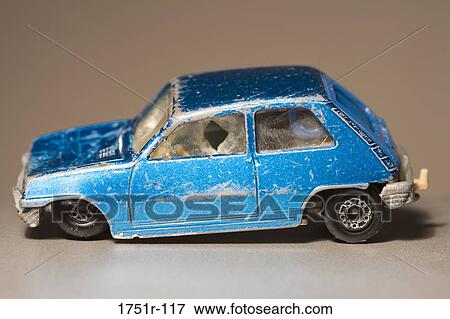 Stock Photo - Close-up of a damaged toy car. Fotosearch