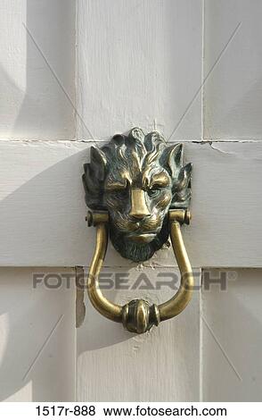 Close-up of a doorknocker View Large Photo Image Stock Photo - Close-up of a doorknocker. Fotosearch
