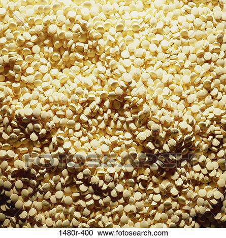 Stock Image - Close-up of a heap of pills. Fotosearch