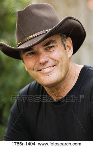 Close-up of a mature country man smiling View Large Photo Image Picture - Close-up of a mature country man smiling. Fotosearch