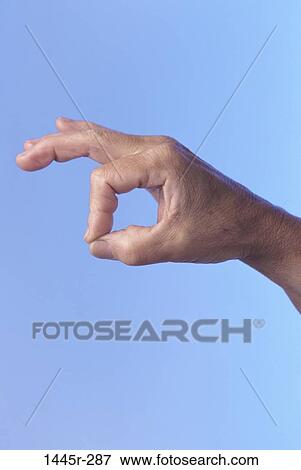 Stock Photo - Close-up of a person's hand. Fotosearch