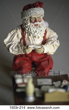 Picture - Close-up of a Santa Claus doll. Fotosearch