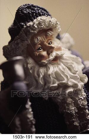 Stock Image - Close-up of a Santa Claus doll. Fotosearch