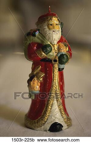 Stock Image - Close-up of a Santa Claus doll. Fotosearch