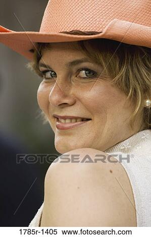 Stock Photography - Close-up of a woman smiling. Fotosearch