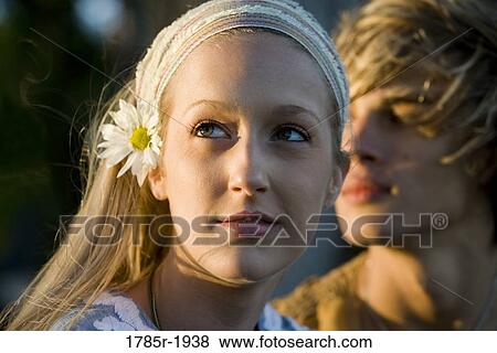 Close up of a young couple View Large Photo Image Stock Photo - Close up of a young couple. Fotosearch