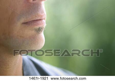 Close-up of a young man's mouth View Large Photo Image Stock Image - Close-up of a young man's mouth. Fotosearch