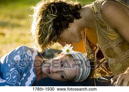 Close-up of affectionate young hippie couple View Large Photo Image Stock Image - Close-up of affectionate young hippie couple. Fotosearch