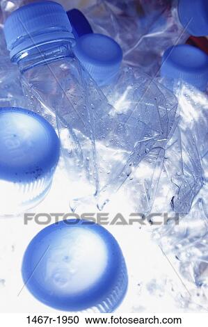 Close-up of bottles of water View Large Photo Image Stock Image - Close-up of bottles of water. Fotosearch
