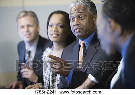 Stock Image - Close up of business people. Fotosearch