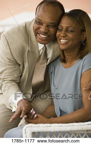 Close-up of mature African American couple smiling View Large Photo Image Stock Photo - Close-up of mature African American couple smiling. Fotosearch