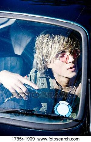 Stock Photo - Close-up of teenage driver. Fotosearch