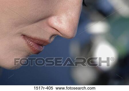 Stock Photography - Close-up of young woman's face. Fotosearch