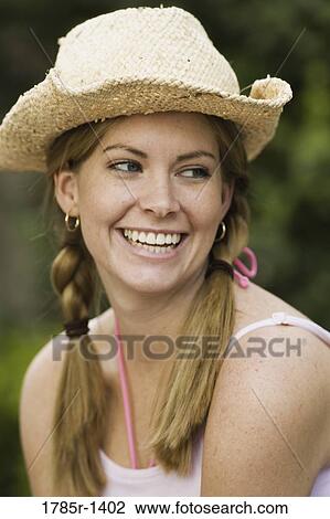Close-up view of a country girl smiling View Large Photo Image Stock Image - Close-up view of a country girl smiling. Fotosearch