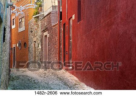 Stock Photograph - Colorful cobblestone street, San Miguel de Allende, Guanajuato, Mexico. Fotosearch