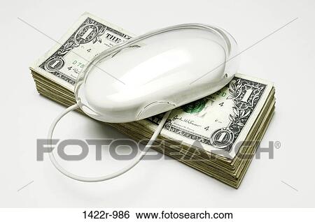 Stock Photograph - Computer mouse on a stack of US currency. Fotosearch