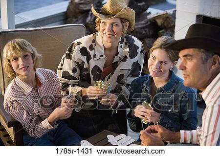 Stock Image - Country family playing cards. Fotosearch