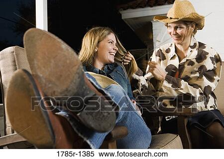 Country mother and daughter smiling View Large Photo Image Stock Photography - Country mother and daughter smiling. Fotosearch