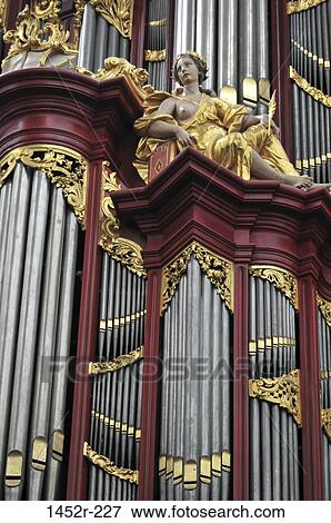 Stock Photo - Details of pipe organs at a church, St. Bavokerk, Haarlem, North Holland, Netherlands. Fotosearch