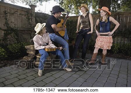 Family playing country music and dancing together View Large Photo Image Stock Photo - Family playing country music and dancing together. Fotosearch