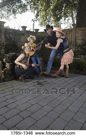 Family playing country music and dancing together View Large Photo Image Stock Photo - Family playing country music and dancing together. Fotosearch