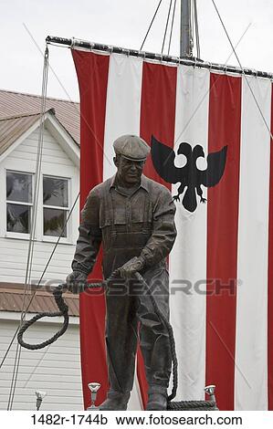 Stock Image - Fisherman's statue, Bojer Wikan Fisherman's Memorial Park, Sons of Norway Hall, Petersburg, Alaska, USA. Fotosearch