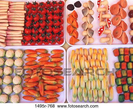 France, Nice, Trays of colorful marzipan made vegetables in farmers market in old town View Large Photo Image Stock Photo - France, Nice, Trays of colorful marzipan made vegetables in farmers market in old town. Fotosearch