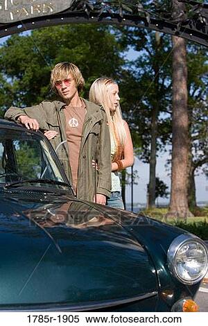 Stock Photography - Hippie couple with car. Fotosearch