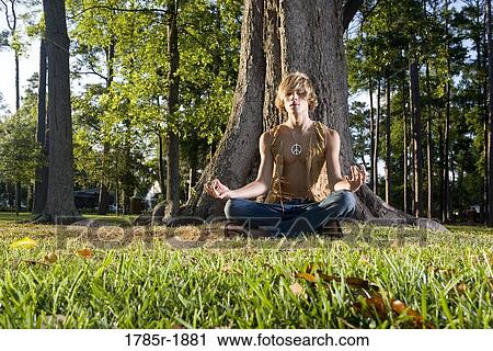 Hippie meditating View Large Photo Image Stock Image - Hippie meditating. Fotosearch
