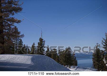Stock Image - Lake by a mountain, Heavenly Mountain, Lake Tahoe, California, USA. Fotosearch
