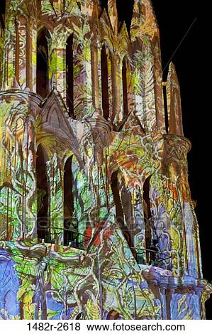 Stock Photo - Laser Light Show on La Parroquia, the parish church of the San Miguel Arcangel, San Miguel de Allende, Guanajuato, Mexico. Fotosearch