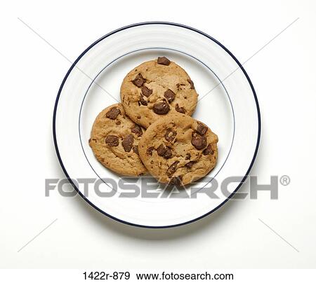 Stock Photo - Late with three chocolate chip cookies. Fotosearch