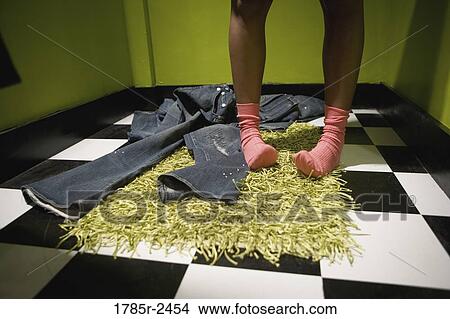 Picture - Legs in dressing room. Fotosearch