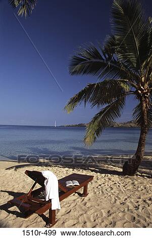 Lounge chair on the beach, Fiji View Large Photo Image Stock Photo - Lounge chair on the beach, Fiji. Fotosearch