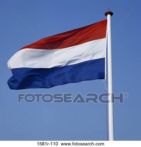 Stock Image - Low angle view of a Dutch flag. Fotosearch