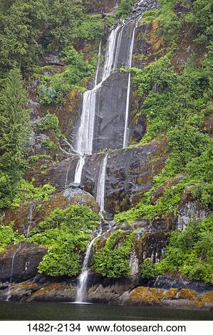 Low angle view of a waterfall, Misty Fiords National Monument, Alaska, USA View Large Photo Image Picture - Low angle view of a waterfall, Misty Fiords National Monument, Alaska, USA. Fotosearch
