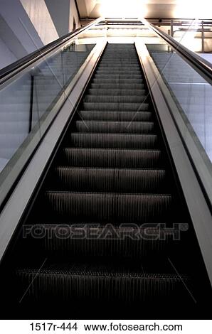 Low angle view of an escalator View Large Photo Image Picture - Low angle view of an escalator. Fotosearch