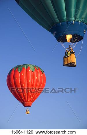 Low angle view of hot air balloons in the air, Horse Heaven Hills, The Great Prosser Balloon Rally, Prosser, Washington State, USA View Large Photo Image Stock Photograph - Low angle view of hot air balloons in the air, Horse Heaven Hills, The Great Prosser Balloon Rally, Prosser, Washington State, USA. Fotosearch